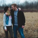 couple friends hug outdoors